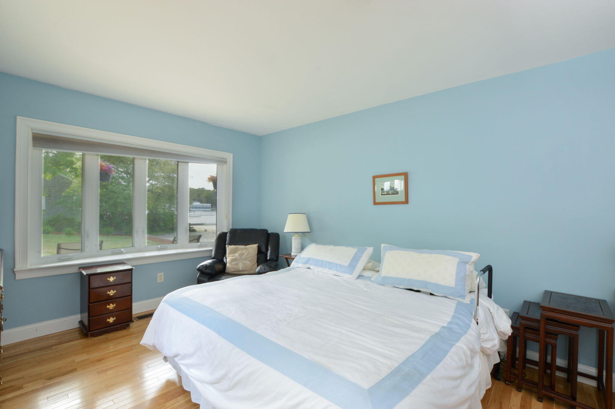 97 Willow Run Drive Centerville, MA 02632 - Photo 16 of 30 a bedroom with a bed and a large window