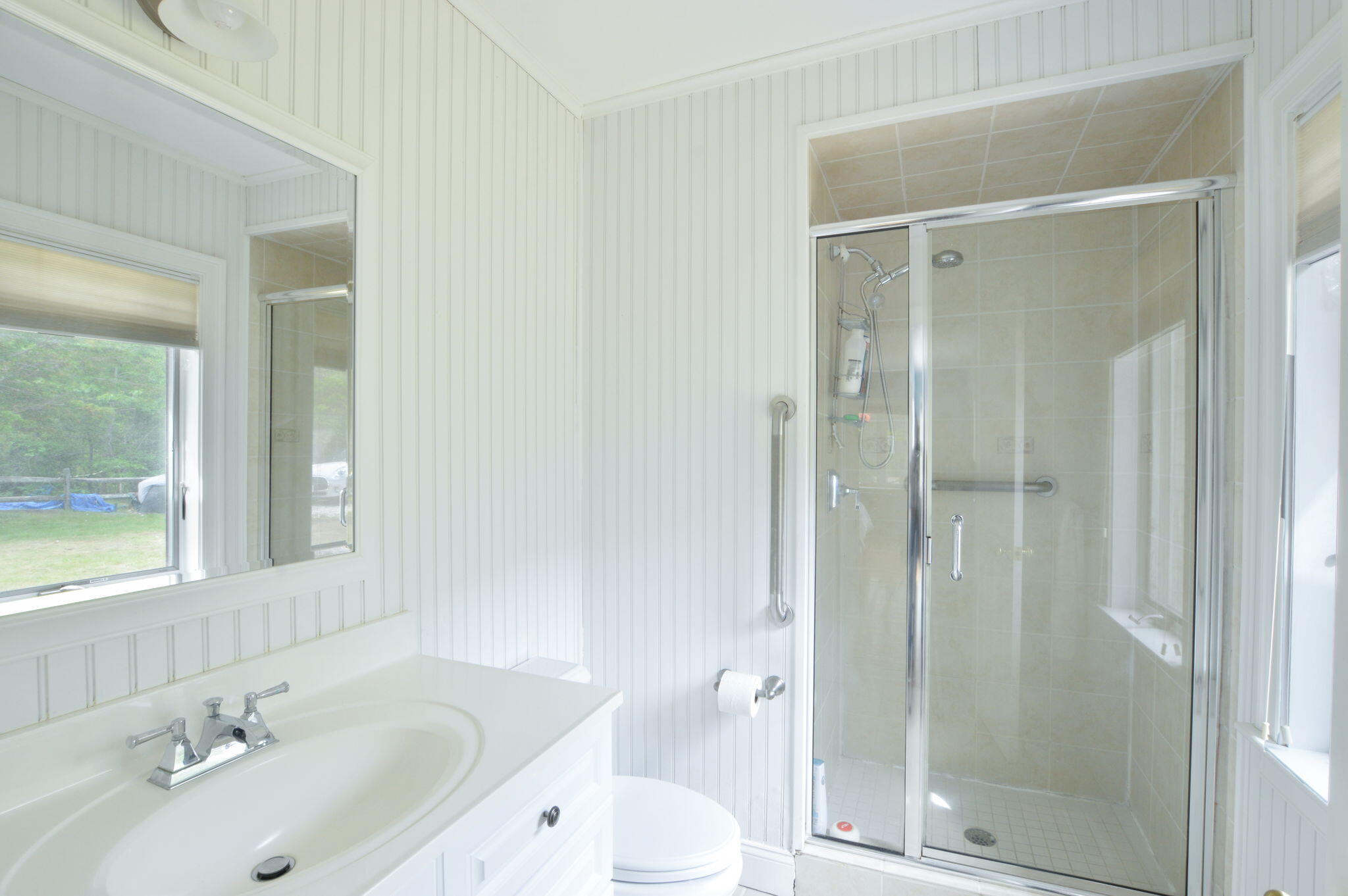 97 Willow Run Drive Centerville, MA 02632 - Photo 17 of 30 a bathroom with a sink toilet and shower