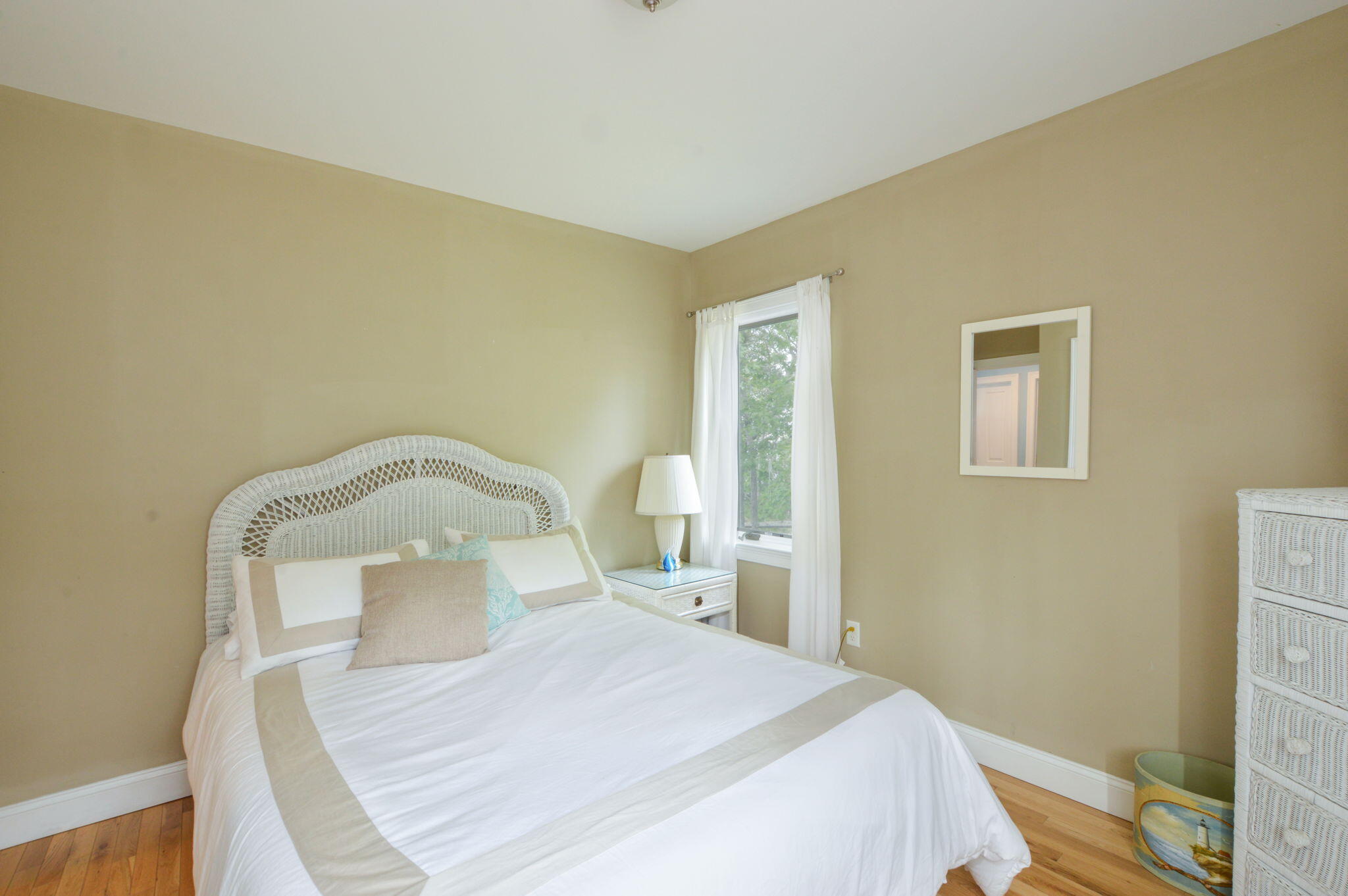 97 Willow Run Drive Centerville, MA 02632 - Photo 19 of 30 a bedroom with a bed and a mirror