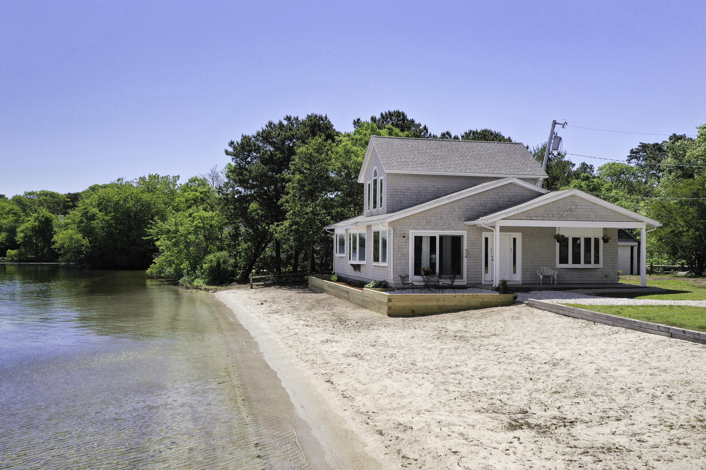 97 Willow Run Drive Centerville, MA 02632 - Photo 28 of 30 a front view of a house with a yard