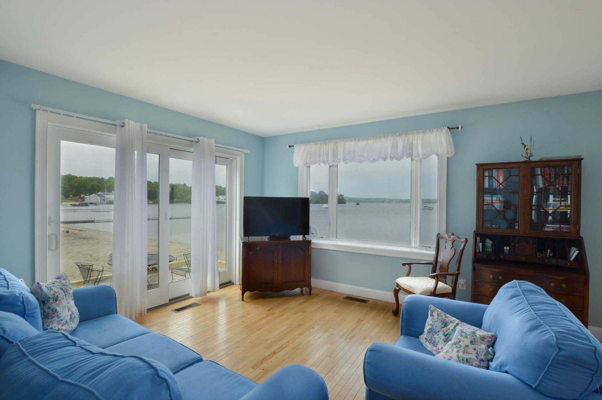 97 Willow Run Drive Centerville, MA 02632 - Photo 4 of 30 a living room with furniture and a flat screen tv