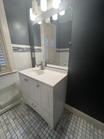 a bathroom with a sink and a toilet
