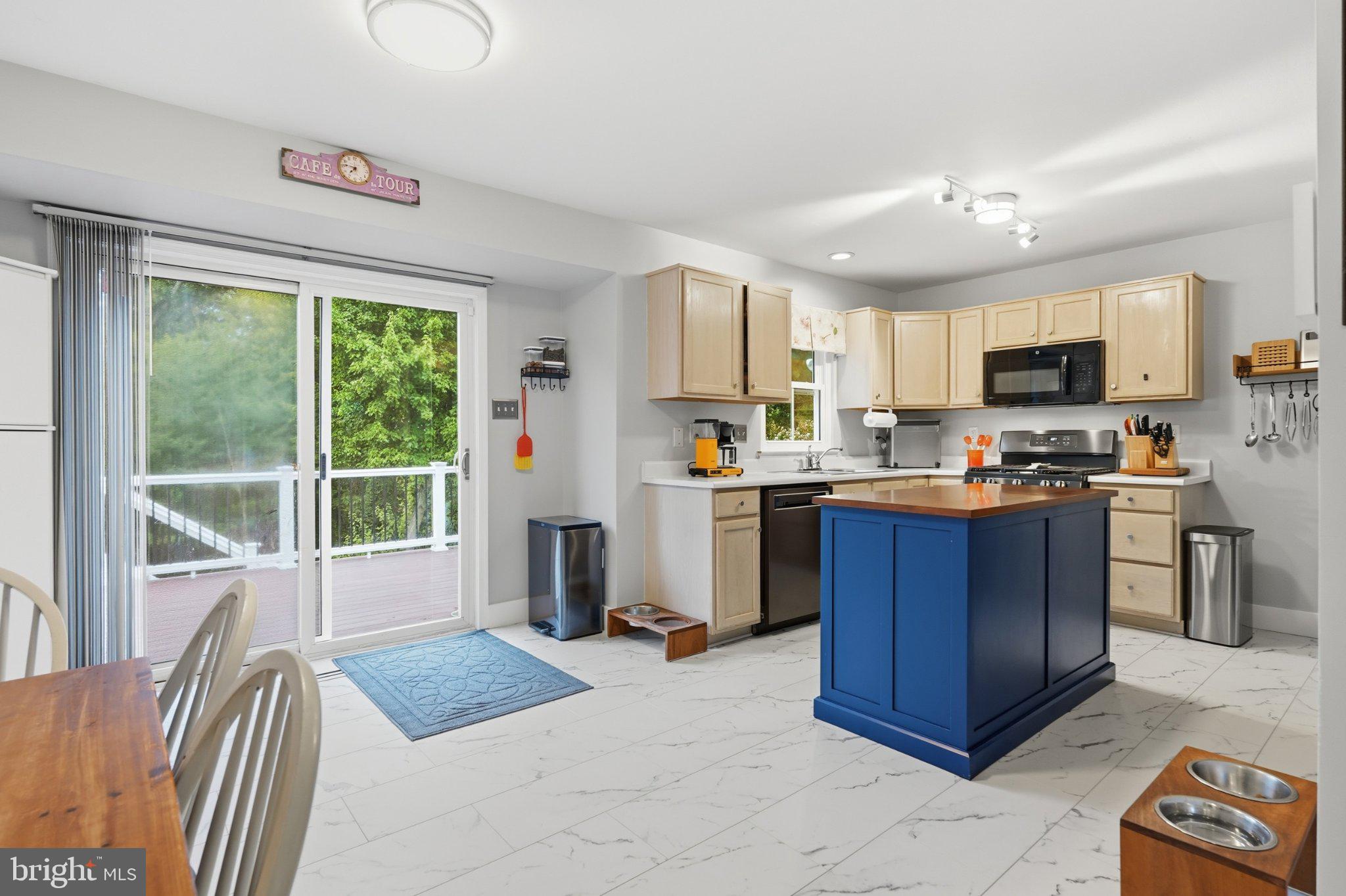 339 Enfield Road Joppa, MD 21085 - Photo 14 of 49 Dining Area, Kitchen, and access to rear deck