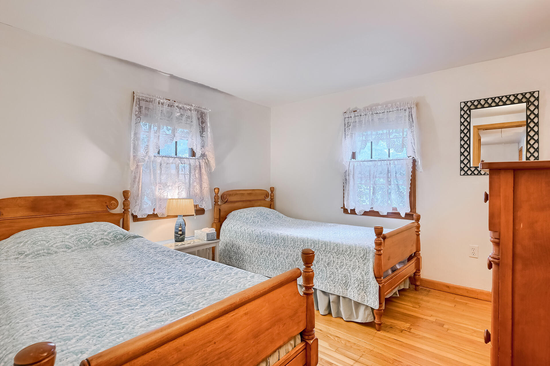 11 Mizzentop Lane Centerville, MA 02632 - Photo 11 of 18 a bedroom with two beds and wooden floor