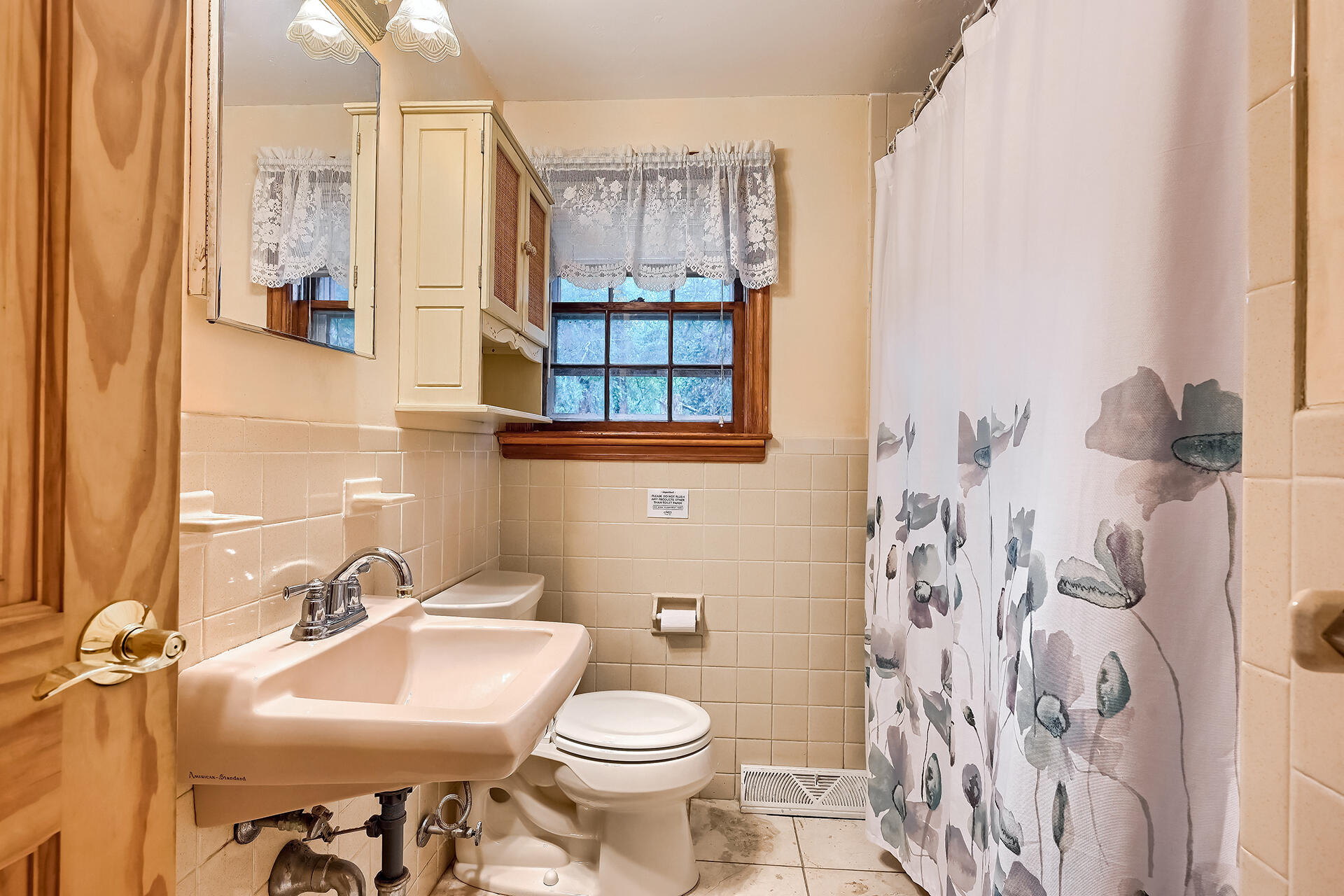 11 Mizzentop Lane Centerville, MA 02632 - Photo 8 of 18 a bathroom with a sink toilet and shower