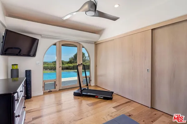 a view of a room with gym equipment