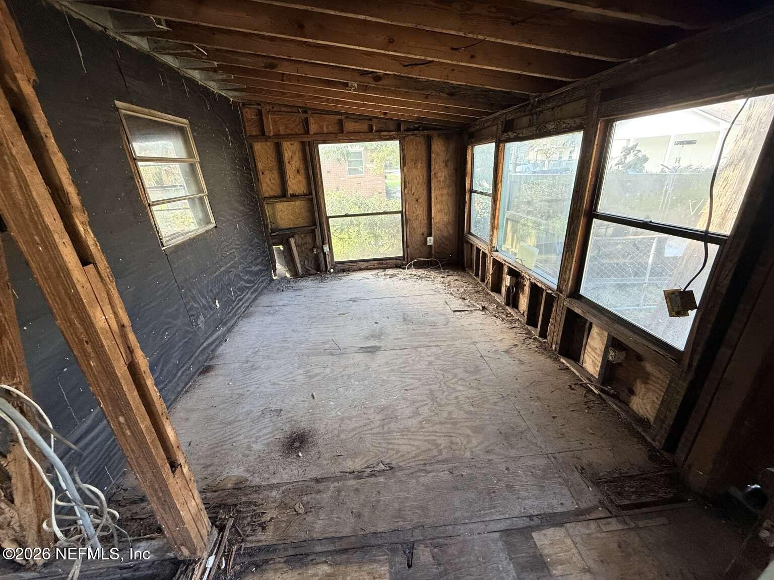 1828 West 3rd Street Jacksonville, FL 32209 - Photo 12 of 14 a view of an empty room with a fireplace