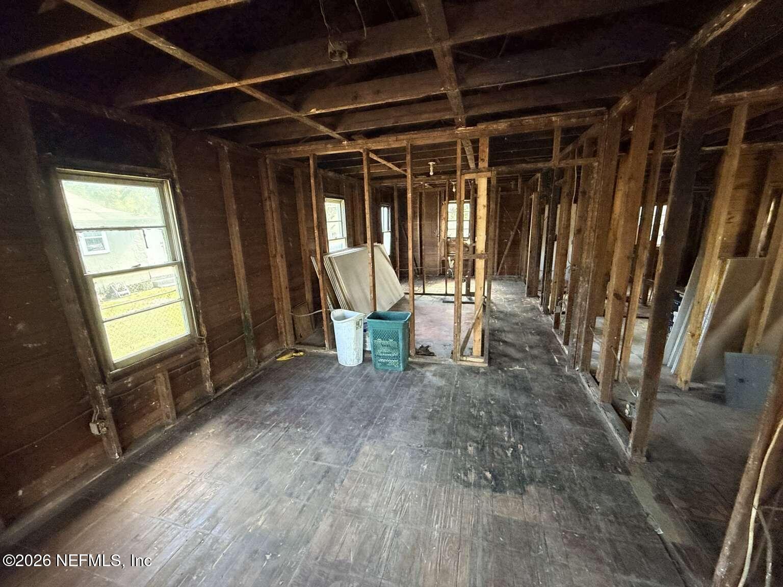 1828 West 3rd Street Jacksonville, FL 32209 - Photo 9 of 14 a view of a room with wooden floor and furniture