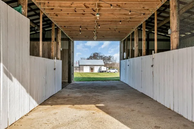 a view of a swimming pool and an outdoor seating