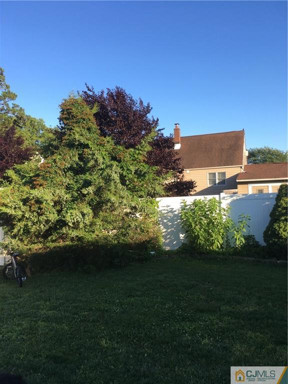 17 Stockton Road New Brunswick, NJ 08901 - Photo 11 of 12 a view of a grassy field with an trees