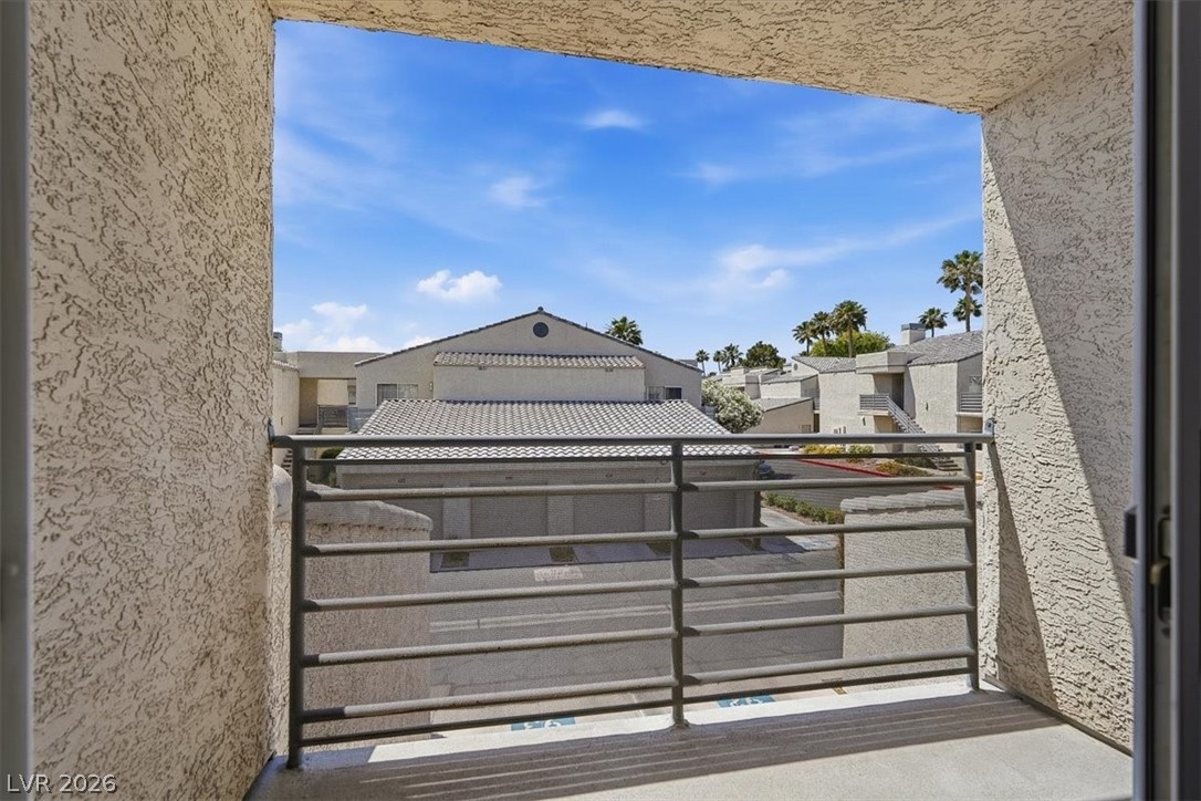 6250 West Flamingo Road, Unit 93 Las Vegas, NV 89103 - Photo 24 of 38 Enjoy views from this charming balcony, a perfect spot for relaxation.