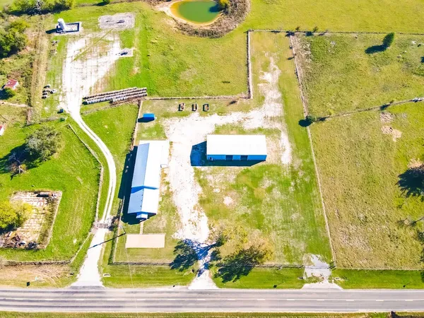a view of a swimming pool with an outdoor space and seating area