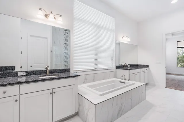 a bathroom with a sink and a bathtub