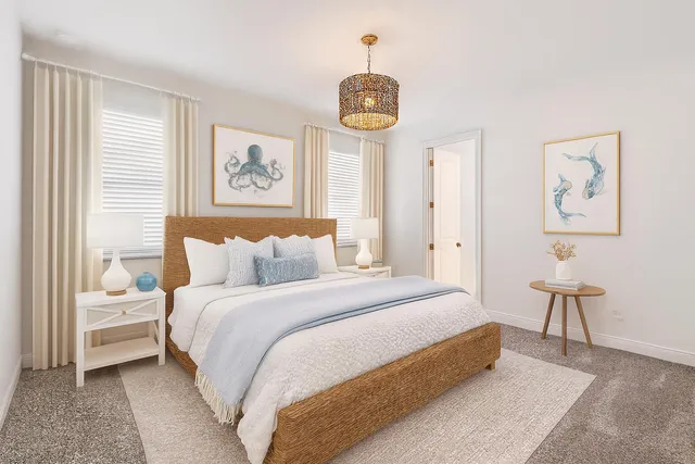 a bedroom with bed and a window