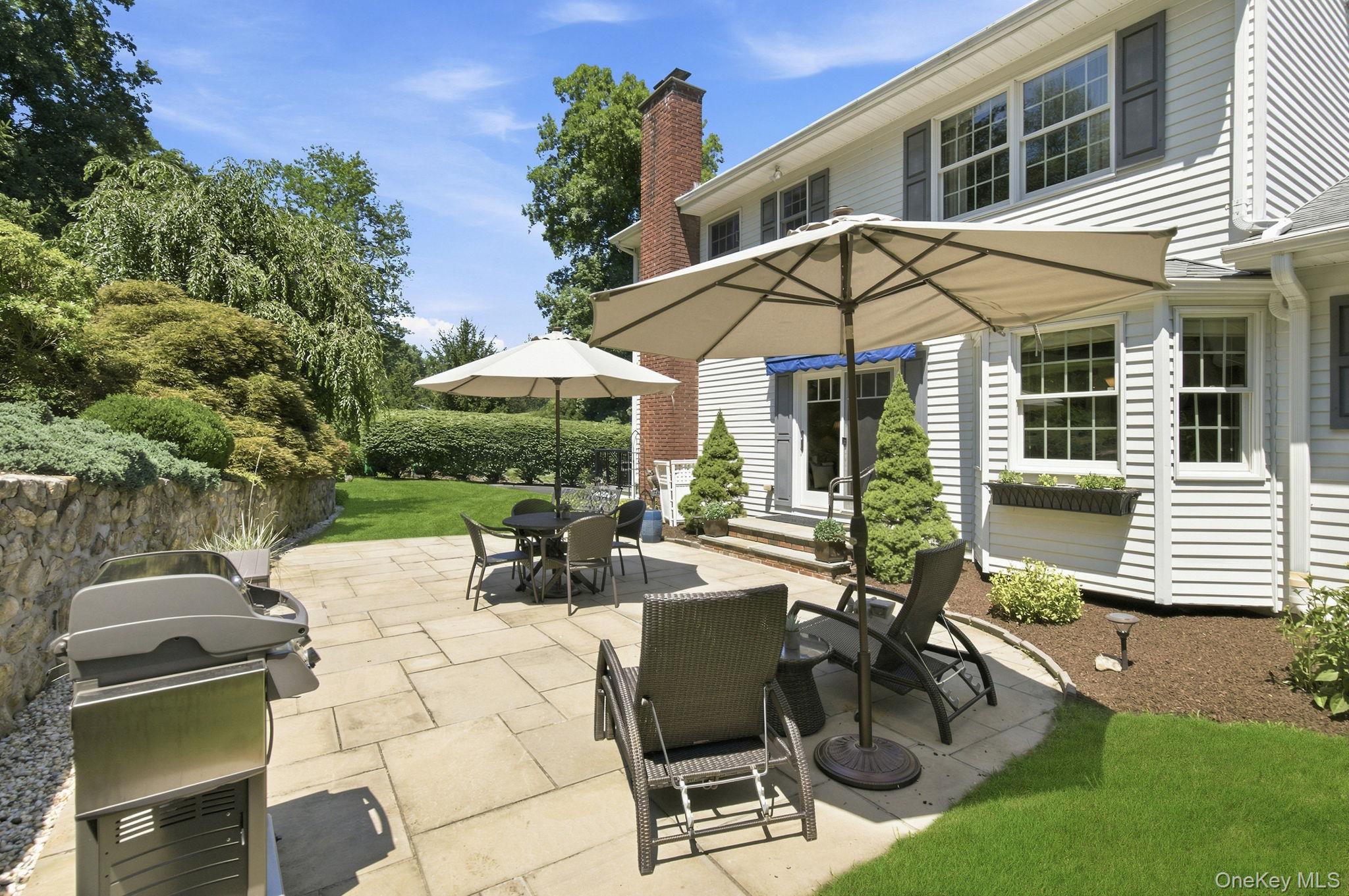 32 Bedell Road Katonah, NY 10536 - Photo 33 of 49 The expansive paver patio offers plenty of room for dining and grilling.