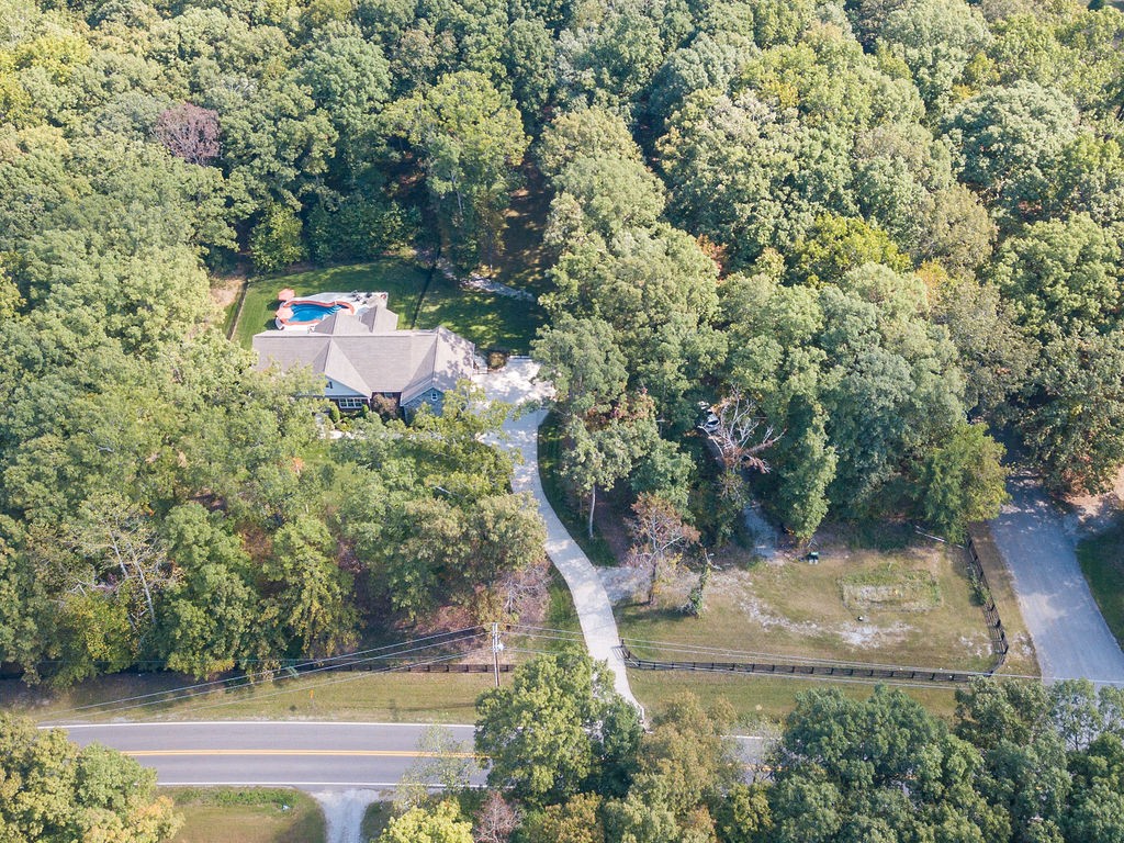 5751 Pinewood Road Franklin, TN 37064 - Photo 4 of 50 an aerial view of a house with a yard
