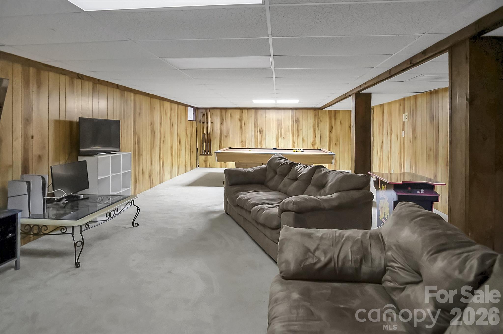 808 Old Mt Holly Road Stanley, NC 28164 - Photo 43 of 48 a living room with furniture and a flat screen tv