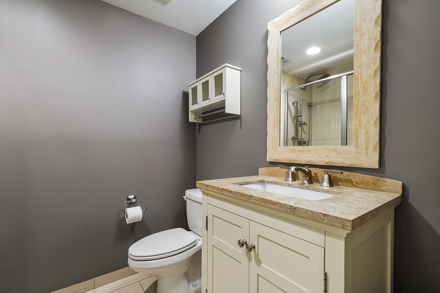 114 Hickory Street Frankfort, IL 60423 - Photo 33 of 46 a bathroom with a toilet sink and mirror