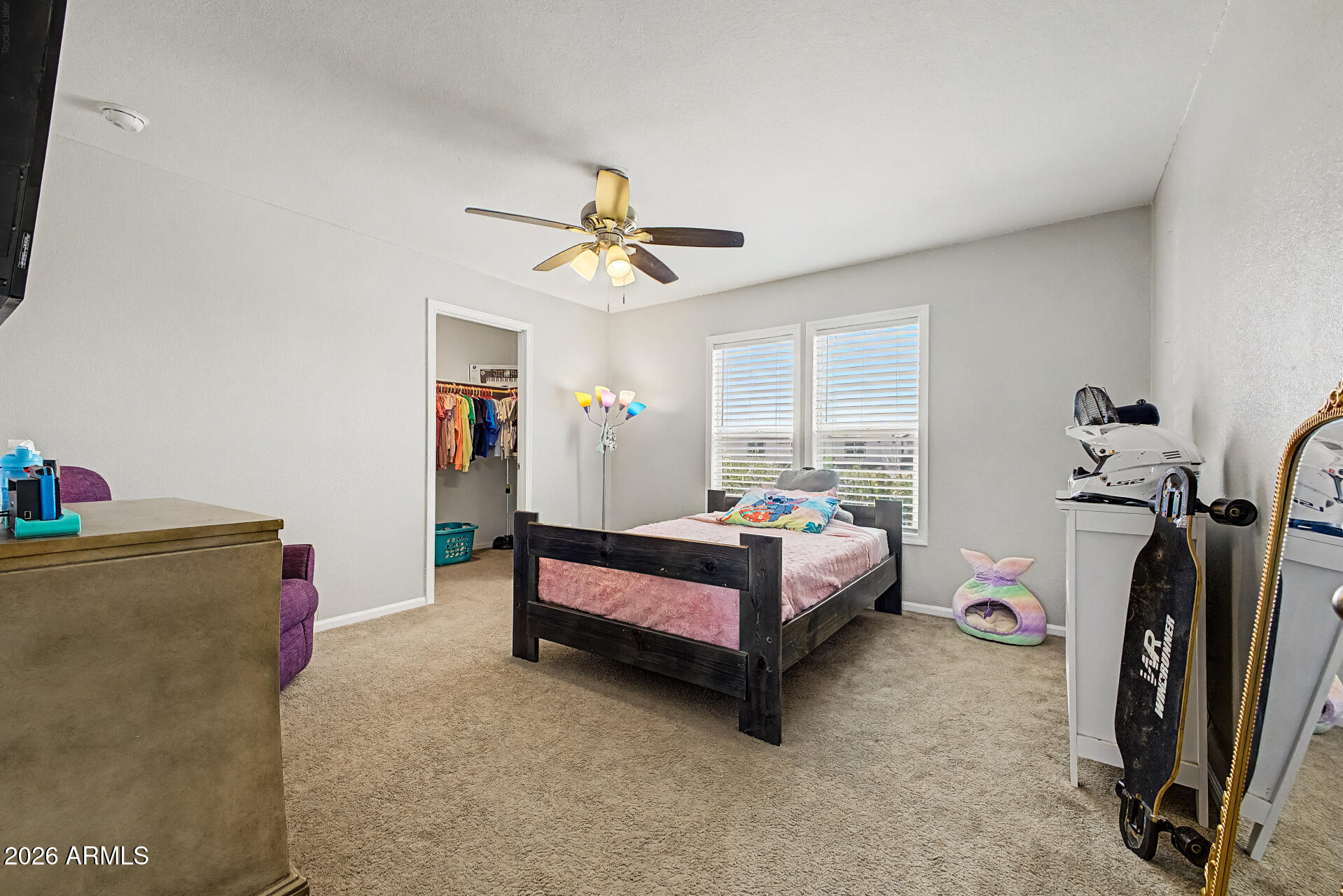 22417 West Dove Valley Road Wittmann, AZ 85361 - Photo 25 of 53 a bed room with a bed and a window