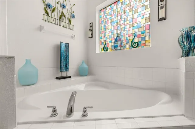 a view of a house with a swimming pool and a garden