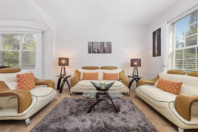 a kitchen with stainless steel appliances granite countertop a sink stove and microwave