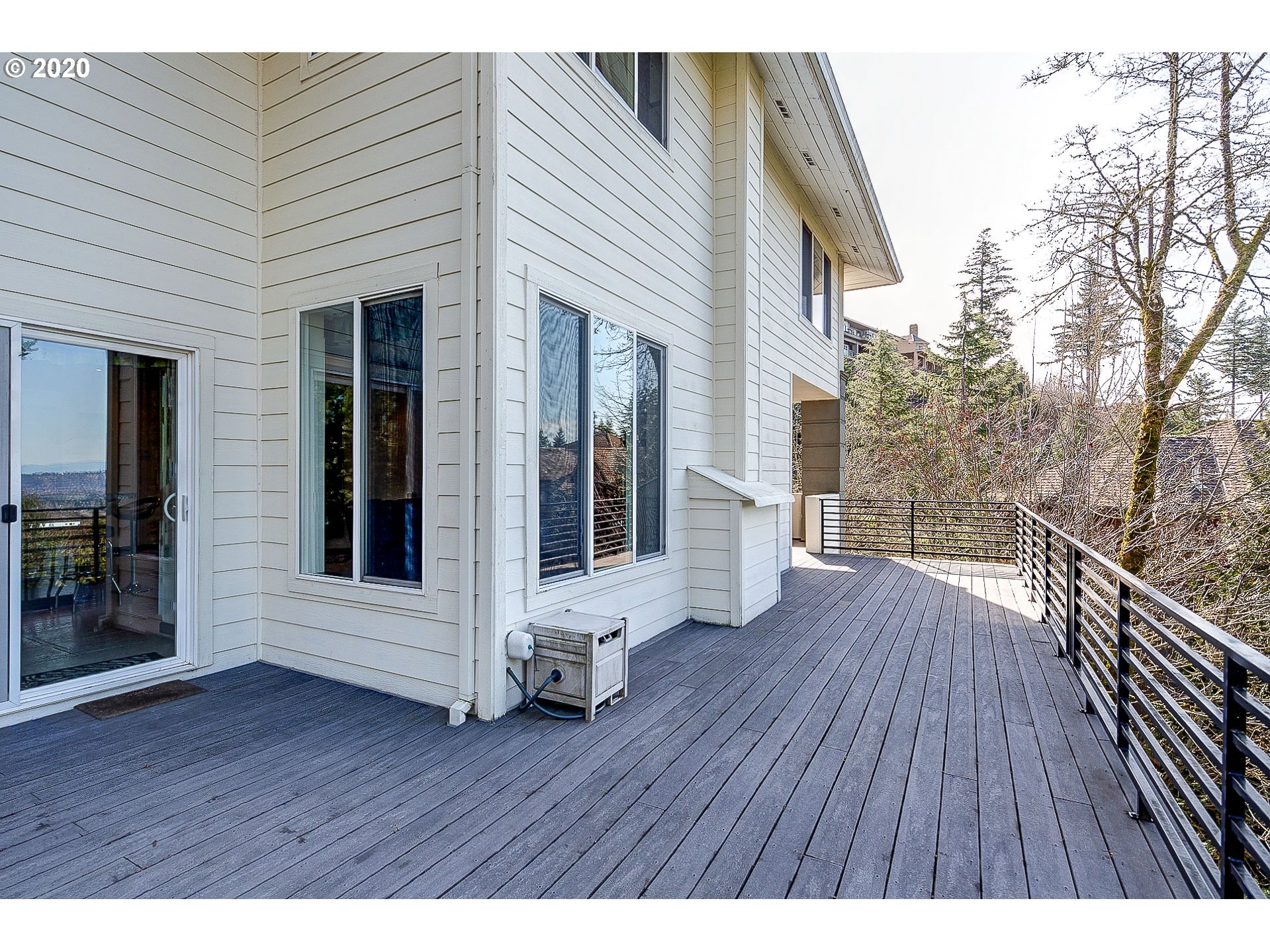 10301 Southeast Crescent Ridge Loop Happy Valley, OR 97086 - Photo 15 of 32 a view of outdoor space and deck with wooden floor