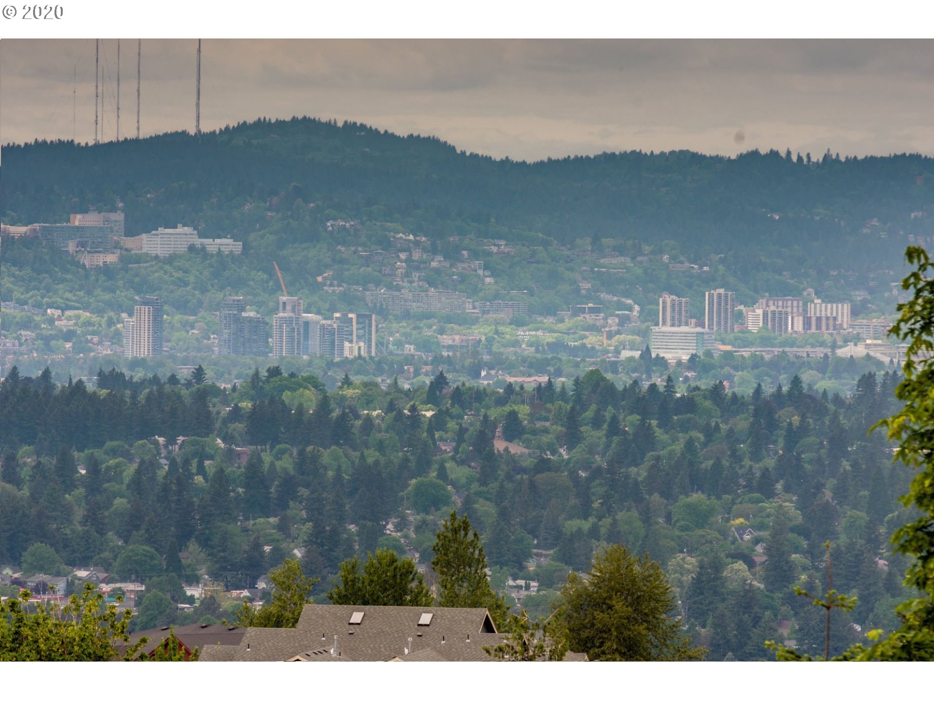 10301 Southeast Crescent Ridge Loop Happy Valley, OR 97086 - Photo 3 of 32 a view of a city