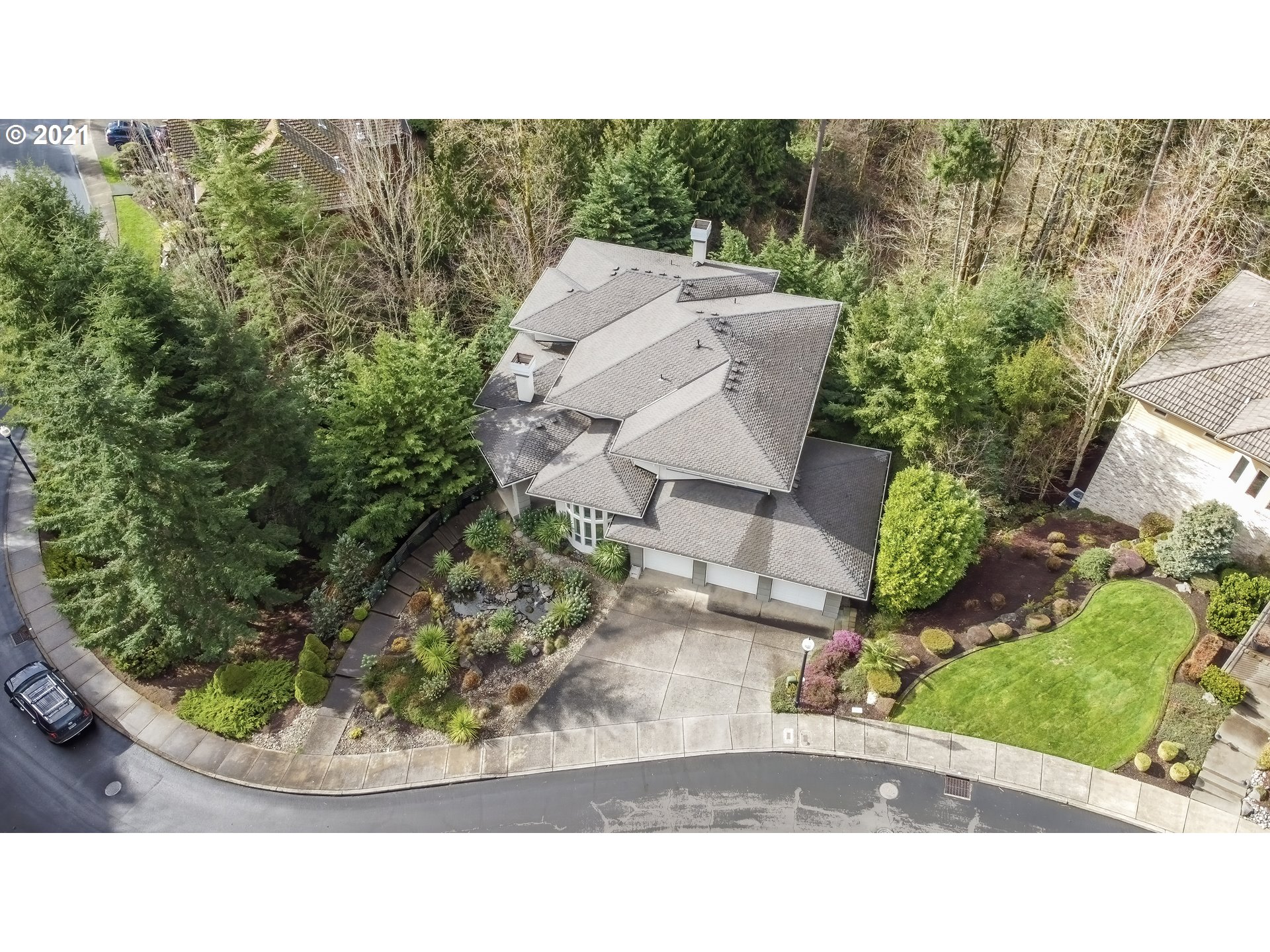 10301 Southeast Crescent Ridge Loop Happy Valley, OR 97086 - Photo 31 of 32 a view of a garden