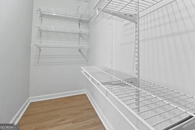 a view of a bedroom from a hallway