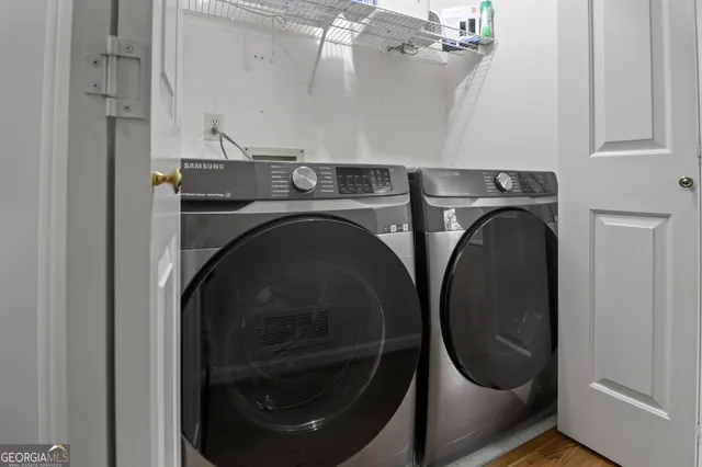 a view of a room with wooden walls