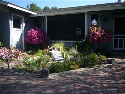 6854 Rodeo Drive Sanger, CA 93657 - Photo 6 of 9 Another view of the front area. This crisp clean look extends throughout the home.