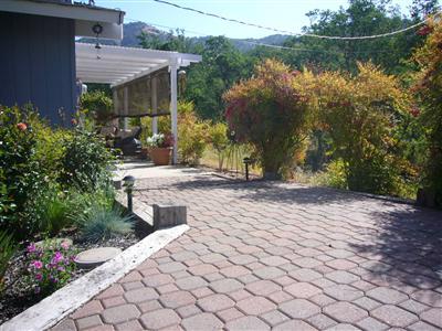 6854 Rodeo Drive Sanger, CA 93657 - Photo 9 of 9 A view from the side yard to the back patio.