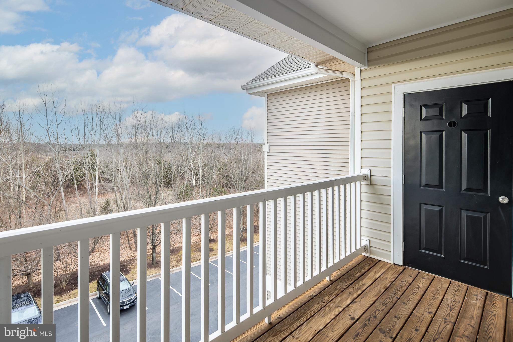 512 Sunset View Terrace Southeast, Unit 402 Leesburg, VA 20175 - Photo 23 of 30 a view of balcony with wooden floor