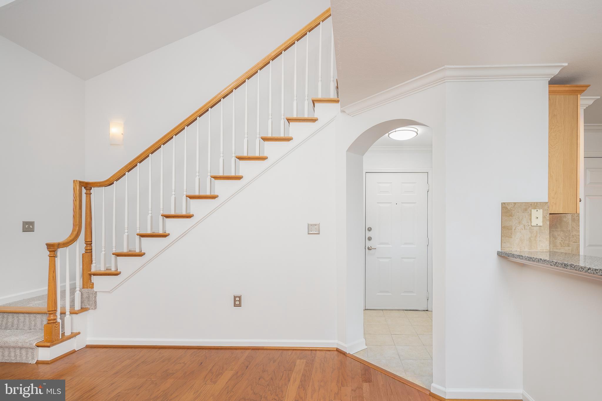 512 Sunset View Terrace Southeast, Unit 402 Leesburg, VA 20175 - Photo 6 of 30 a view of entryway and hall with wooden floor