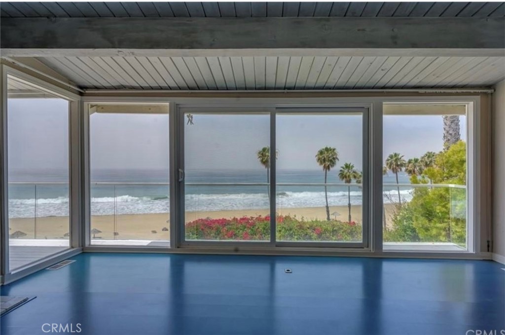 122 Spindrift Lane Rancho Palos Verdes, CA 90275 - Photo 4 of 17 a view of a room that has wooden floor and a large window