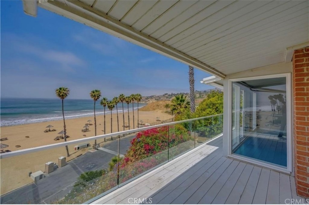 122 Spindrift Lane Rancho Palos Verdes, CA 90275 - Photo 5 of 17 a view of balcony with wooden floor and potted plants
