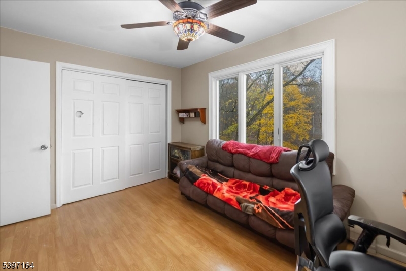 53 Pequot Road Ringwood, NJ 07456 - Photo 25 of 35 a living room with furniture and a large window