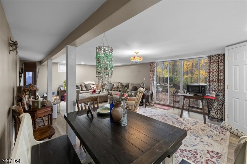 53 Pequot Road Ringwood, NJ 07456 - Photo 30 of 35 a living room with furniture and a large window