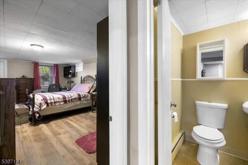 53 Pequot Road Ringwood, NJ 07456 - Photo 33 of 35 a bedroom with a bed and a couch