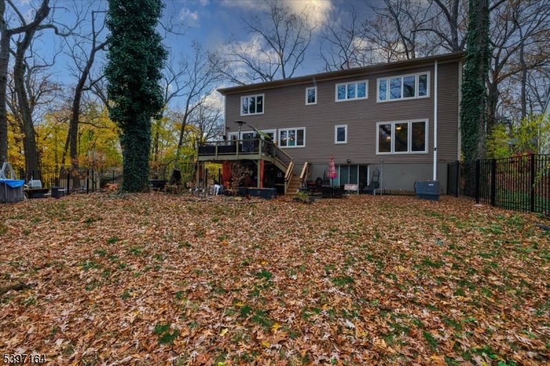 53 Pequot Road Ringwood, NJ 07456 - Photo 4 of 35 a front view of a house with large trees