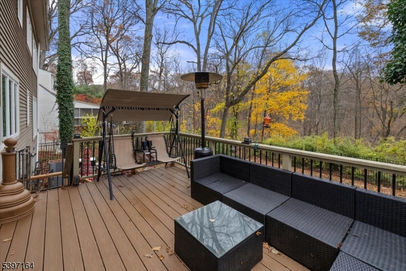 53 Pequot Road Ringwood, NJ 07456 - Photo 5 of 35 a view of balcony with wooden floor and outdoor seating