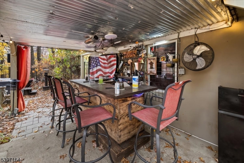 53 Pequot Road Ringwood, NJ 07456 - Photo 6 of 35 a view of a chairs and table in a room