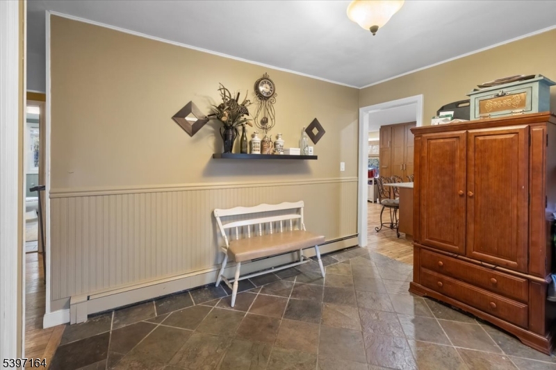 53 Pequot Road Ringwood, NJ 07456 - Photo 7 of 35 a view of a room with racks on the wall