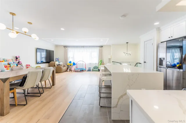 a living room with furniture and a table