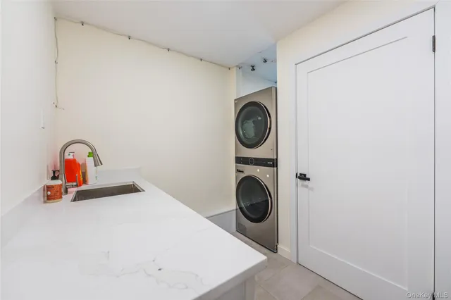 a view of a storage & utility room with washer and dryer