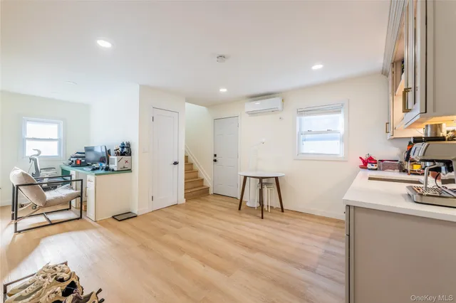 a workspace with furniture and window