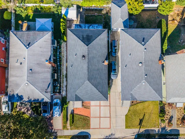 an aerial view of houses with outdoor space