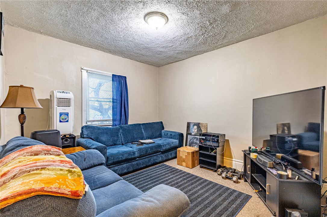1214 Portland Avenue Rochester, NY 14621 - Photo 14 of 22 Upstairs Living Room