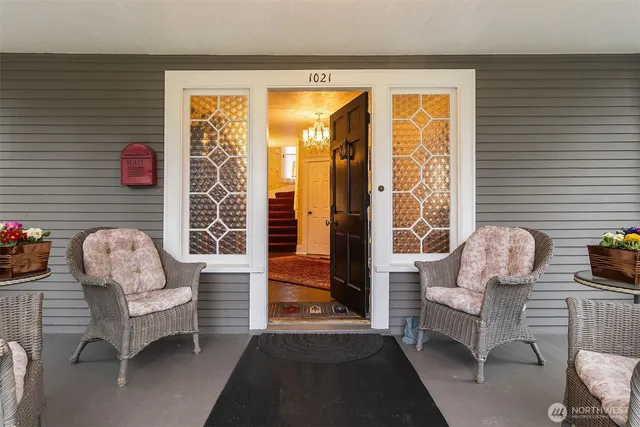 a living room with furniture and a window