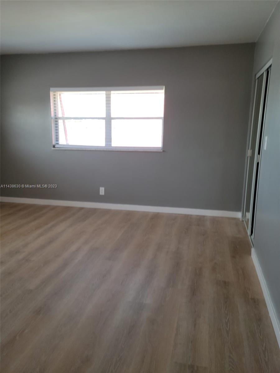 5321 Northwest 27th Street, Unit A4 Lauderhill, FL 33313 - Photo 11 of 19 a view of a window in an empty room